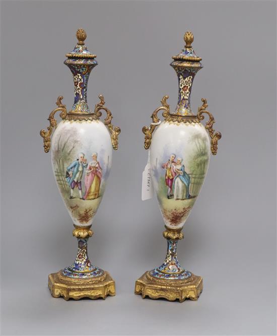 A pair of sevres style champleve painted vases with lids signed Roche H.36cm